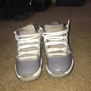 Cool grey Jordan 11 lows.Great condo for a restore
